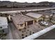 Aerial view of two-story home with driveway and landscaping at 10185 Sequoia Falls Pl, Las Vegas, NV 89149