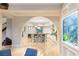 View of kitchen from breakfast nook, featuring an island and white cabinets at 10308 Rocky Mesa Ct, Las Vegas, NV 89144