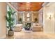 Elegant living room with fireplace and a beautiful chandelier at 10308 Rocky Mesa Ct, Las Vegas, NV 89144