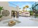 Outdoor patio with fire pit and spiral staircase at 10308 Rocky Mesa Ct, Las Vegas, NV 89144