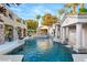 Resort-style pool with waterfall, spa, and outdoor entertaining area at 10308 Rocky Mesa Ct, Las Vegas, NV 89144