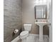 Powder room with pedestal sink and textured wall at 1221 Olivia Pkwy, Henderson, NV 89011