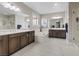 Spa-like bathroom with double vanity, soaking tub, and a large walk-in shower at 1221 Olivia Pkwy, Henderson, NV 89011