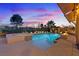 Relaxing pool and spa with fire pit feature at 1221 Olivia Pkwy, Henderson, NV 89011