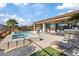 Luxury pool, spa, and patio area; outdoor seating at 1221 Olivia Pkwy, Henderson, NV 89011