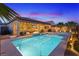 Stunning pool and spa at sunset; resort style at 1221 Olivia Pkwy, Henderson, NV 89011