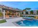 Stunning backyard with pool, spa, and covered patio at 12456 Edinburgh Cask Ave, Las Vegas, NV 89138