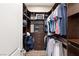 Well-organized walk-in closet with custom shelving at 12456 Edinburgh Cask Ave, Las Vegas, NV 89138