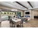 Bright dining area with sliding glass doors leading to backyard oasis at 12456 Edinburgh Cask Ave, Las Vegas, NV 89138