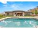 Single-story home with a large pool and patio at 12456 Edinburgh Cask Ave, Las Vegas, NV 89138