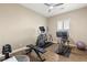 Well-equipped home gym featuring various exercise machines and free weights at 12456 Edinburgh Cask Ave, Las Vegas, NV 89138