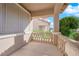 Covered porch with railing offering a view of the neighborhood at 1326 Summer Dawn Ave, Henderson, NV 89014