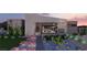 Modern home with landscaped yard and outdoor lighting at 1485 Placid Coast Ct, Henderson, NV 89011