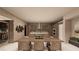 Modern kitchen and dining area with wine storage at 1488 Placid Coast Ct, Henderson, NV 89011