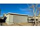 View of the home's back exterior and side yard at 1924 Hart Ave, North Las Vegas, NV 89032