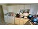 Kitchen with sink, cabinets and washer at 1924 Hart Ave, North Las Vegas, NV 89032