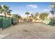 Large backyard with shed and raised garden beds at 1932 Barrow Glen Ct, North Las Vegas, NV 89084