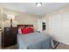 Bright bedroom featuring a double bed and built-in wardrobe at 1932 Barrow Glen Ct, North Las Vegas, NV 89084