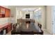 Dining area with a large table and access to the kitchen at 1932 Barrow Glen Ct, North Las Vegas, NV 89084