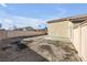 Large backyard with gravel and a concrete patio at 2005 Ona Marie Ave, North Las Vegas, NV 89032