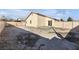 Large backyard with gravel and a concrete patio at 2005 Ona Marie Ave, North Las Vegas, NV 89032