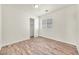 Simple bedroom with wood-look flooring and a closet at 2005 Ona Marie Ave, North Las Vegas, NV 89032