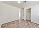 Bright bedroom with wood-look flooring and a closet at 2005 Ona Marie Ave, North Las Vegas, NV 89032