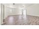 Bright living room featuring grey vinyl plank flooring and lots of natural light at 2005 Ona Marie Ave, North Las Vegas, NV 89032