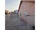 The backyard has a fenced-in area and a concrete patio at 2108 Buckeye Reef St, Henderson, NV 89002