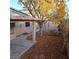 View of the backyard with a covered patio and shed at 2108 Buckeye Reef St, Henderson, NV 89002