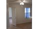 Simple bedroom with tile floors and window at 2108 Buckeye Reef St, Henderson, NV 89002