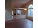 Spacious dining area with tile flooring and a view into the living room at 2108 Buckeye Reef St, Henderson, NV 89002