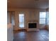 Living room featuring a fireplace and patio access at 2108 Buckeye Reef St, Henderson, NV 89002