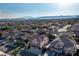 Aerial view of home and neighborhood with mountain backdrop at 3115 Azure Bay St, Las Vegas, NV 89117