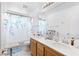 Clean bathroom with double sinks and a shower/tub combo at 3115 Azure Bay St, Las Vegas, NV 89117