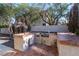 Built-in outdoor kitchen with grill and sink at 3115 Azure Bay St, Las Vegas, NV 89117