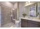 Bathroom with walk-in shower and modern vanity at 3267 Royal Fortune Dr, Las Vegas, NV 89141