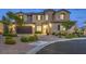 Two-story house with landscaping and dark garage door at 3267 Royal Fortune Dr, Las Vegas, NV 89141