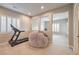 Upper-level home gym with treadmill and beanbag chair at 3267 Royal Fortune Dr, Las Vegas, NV 89141