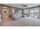 Spacious living room with sectional sofa and access to balcony at 3267 Royal Fortune Dr, Las Vegas, NV 89141