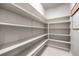 Large walk-in pantry with adjustable shelving for ample storage at 3267 Royal Fortune Dr, Las Vegas, NV 89141