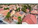 Aerial view of house with red tile roof and solar panels at 3320 Haven Beach Way, Las Vegas, NV 89117