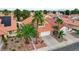 Inviting two-story home with a spacious two-car garage and mature palm trees enhancing the curb appeal at 3320 Haven Beach Way, Las Vegas, NV 89117