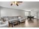 Living room with hardwood floors and view into dining area at 3320 Haven Beach Way, Las Vegas, NV 89117