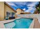 Private pool with waterfall feature and patio at 3320 Haven Beach Way, Las Vegas, NV 89117