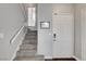 Carpeted staircase with white railings leading to the upper level of the house at 3320 Haven Beach Way, Las Vegas, NV 89117