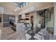 Kitchen and dining area with glass table and modern chairs at 37 Reflection Shores Ln, Henderson, NV 89011