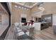 Open dining area with glass table and view of backyard at 37 Reflection Shores Ln, Henderson, NV 89011