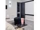 Home theater showing seating, side table with popcorn and electronics closet at 37 Reflection Shores Ln, Henderson, NV 89011