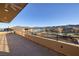 Expansive outdoor patio with views of the lake and golf course at 37 Reflection Shores Ln, Henderson, NV 89011
